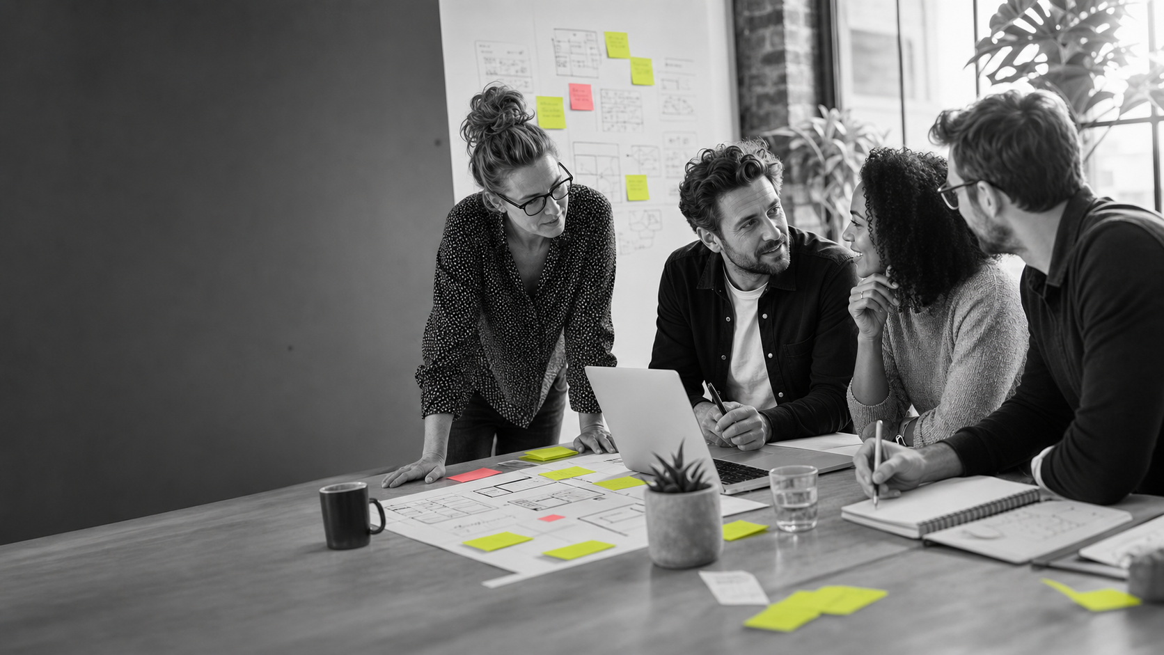Business owners working through priorities together in a coaching session
